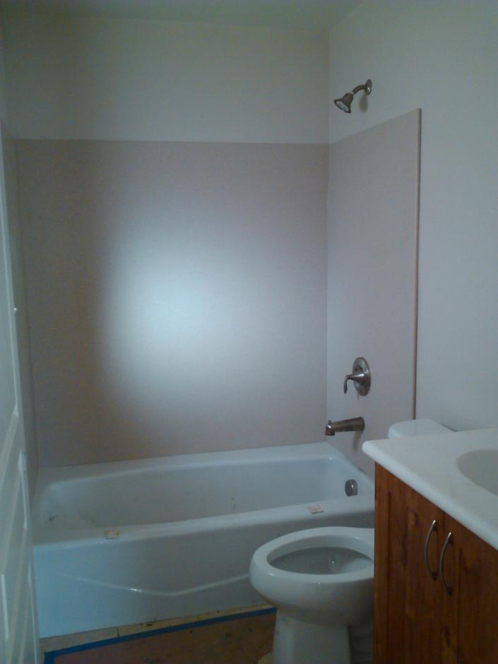 The bathroom space includes tub/shower option with one unit fully ADA compliant.