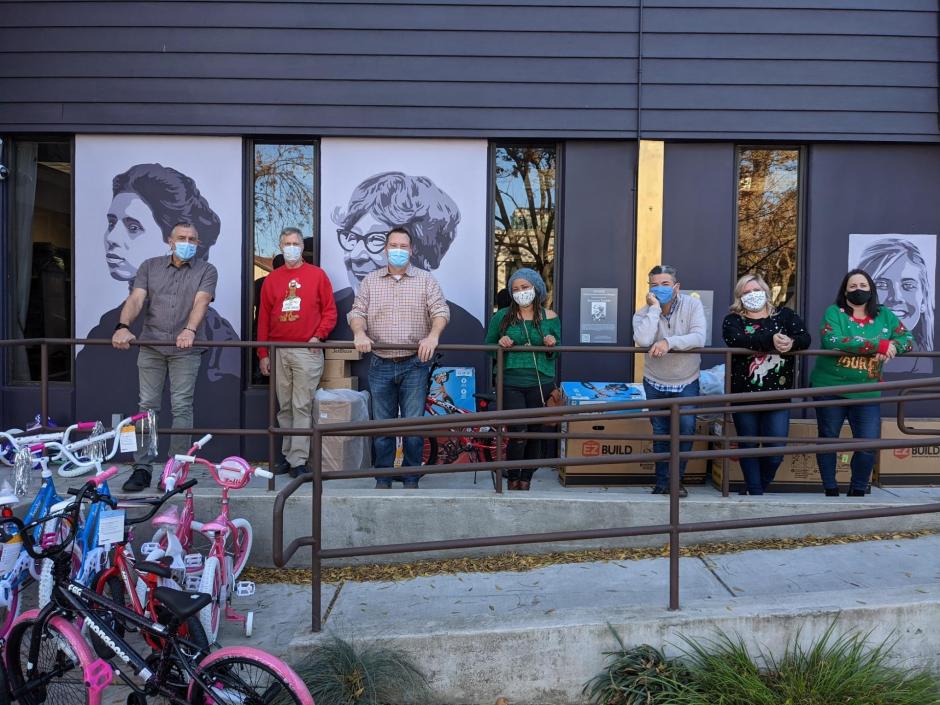 Bikes and helmets in front of WEAVE's office.