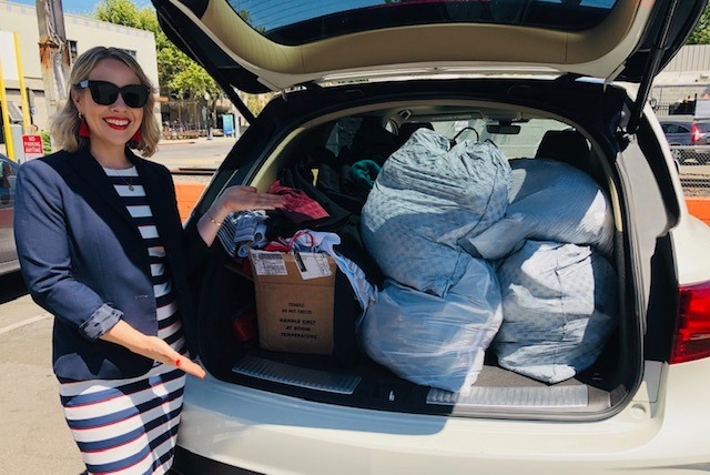 Renee Drandell-Rees with donations