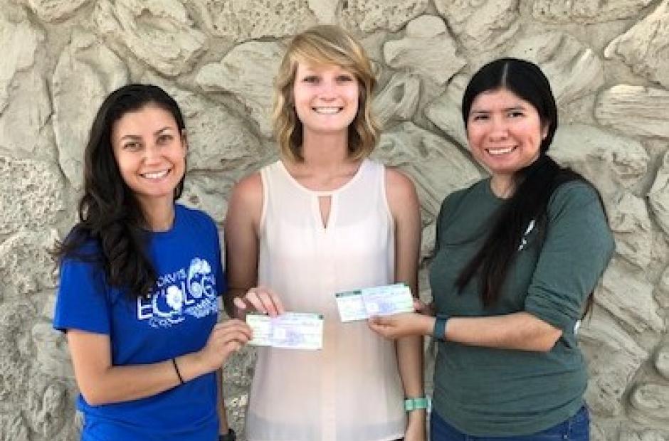 UC Davis Ecology Grads presenting checks