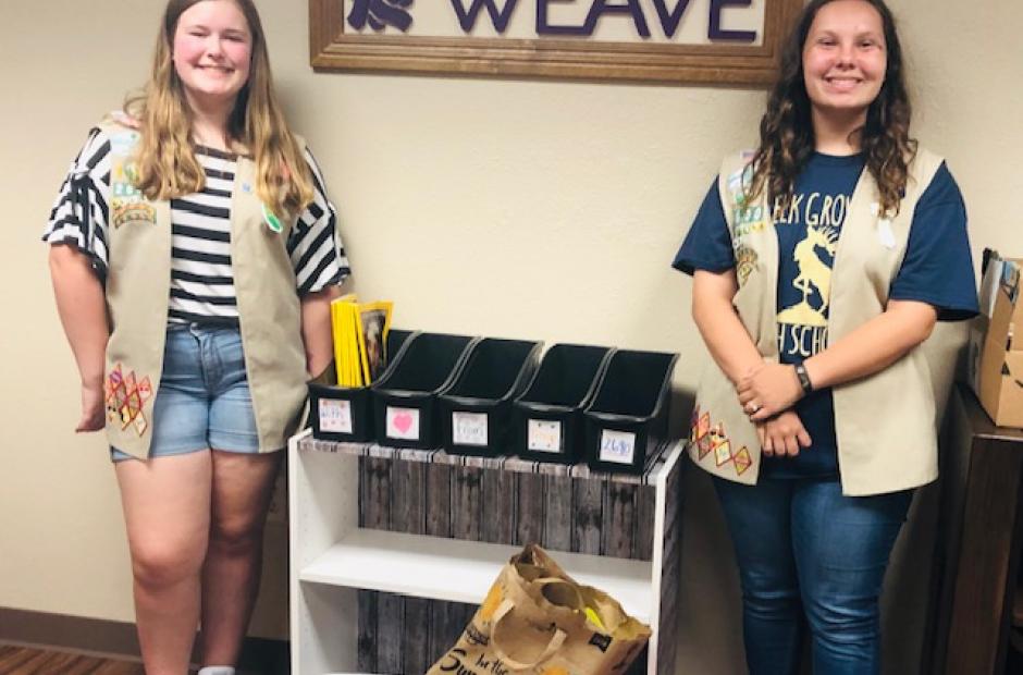 Girl Scout Troop 2690 and bookcase